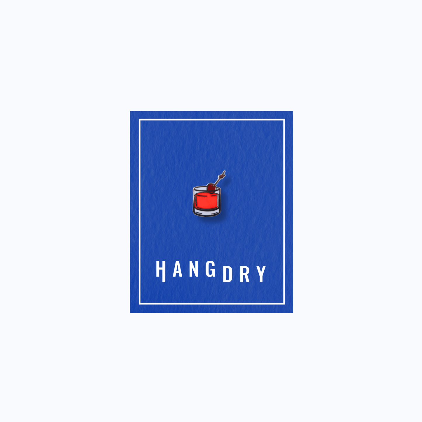 Hang Dry Sunday Dinner enamel pin — rocks glass shape, displayed on Hang Dry blue branded card