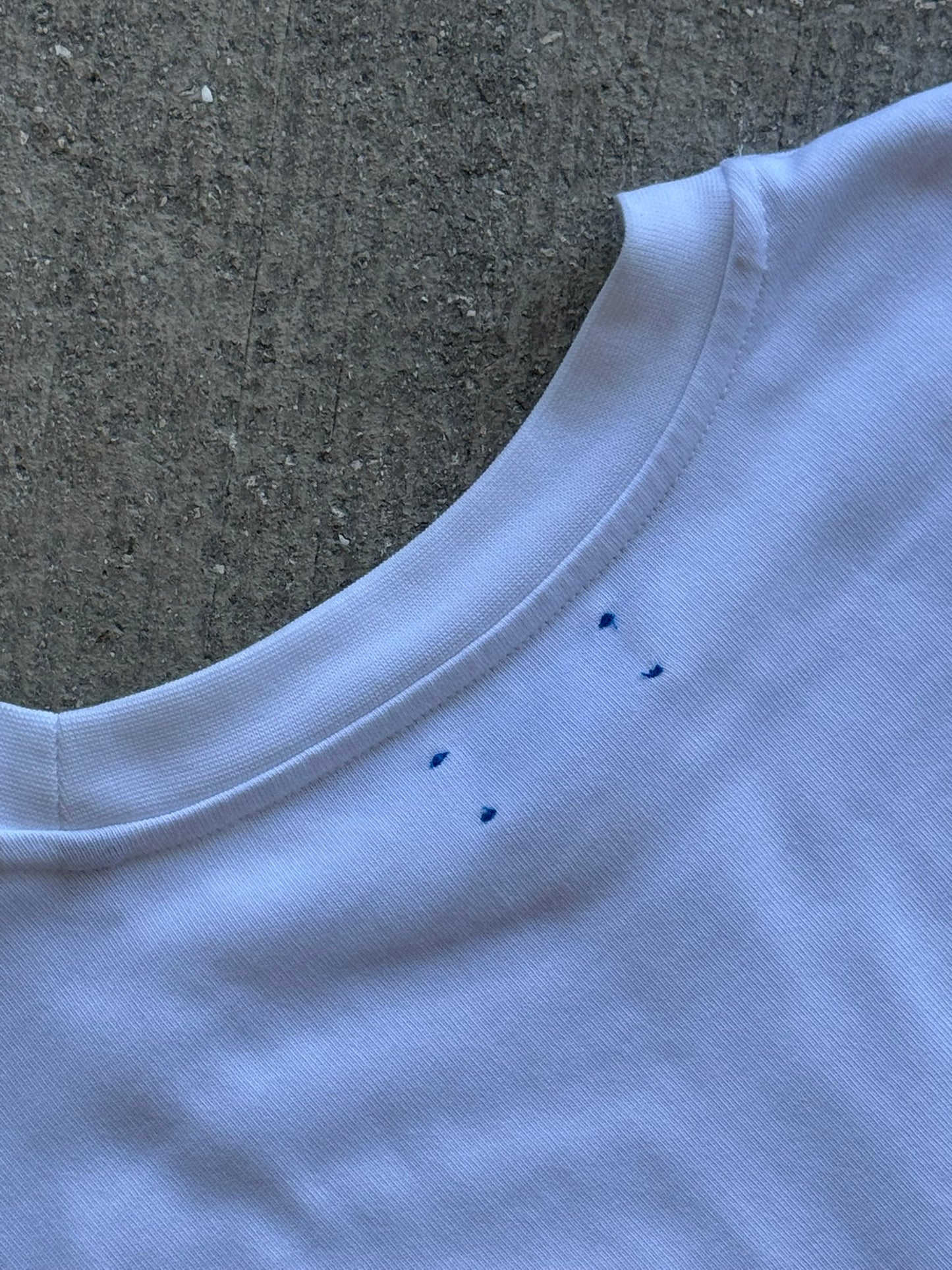 Hang Dry Gallery White Sunday Dinner tee — close-up detail of the hand and cocktail tray illustration