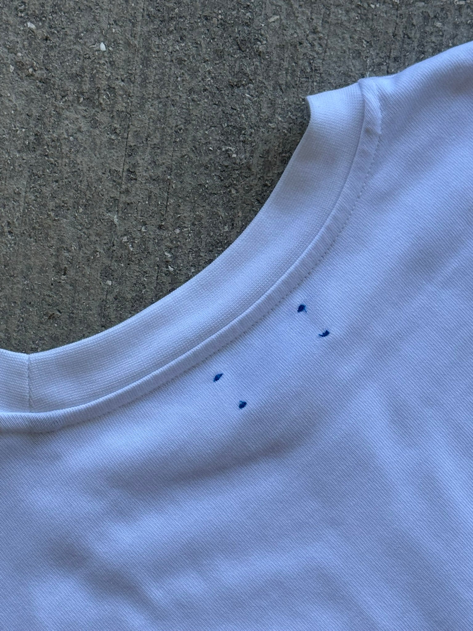 Hang Dry Gallery White Sunday Dinner tee — close-up detail of the hand and cocktail tray illustration