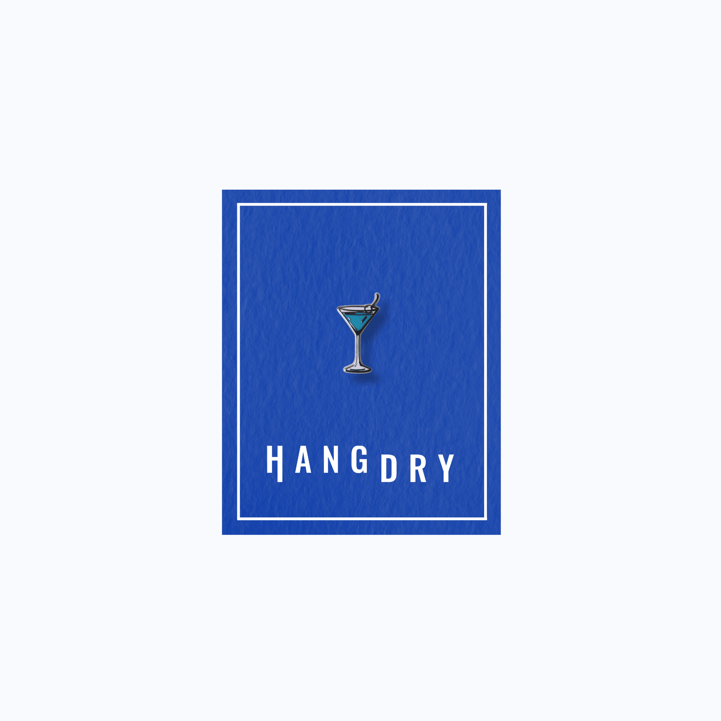 Hang Dry Sunday Dinner enamel pin — classic martini glass shape, displayed on Hang Dry blue branded card