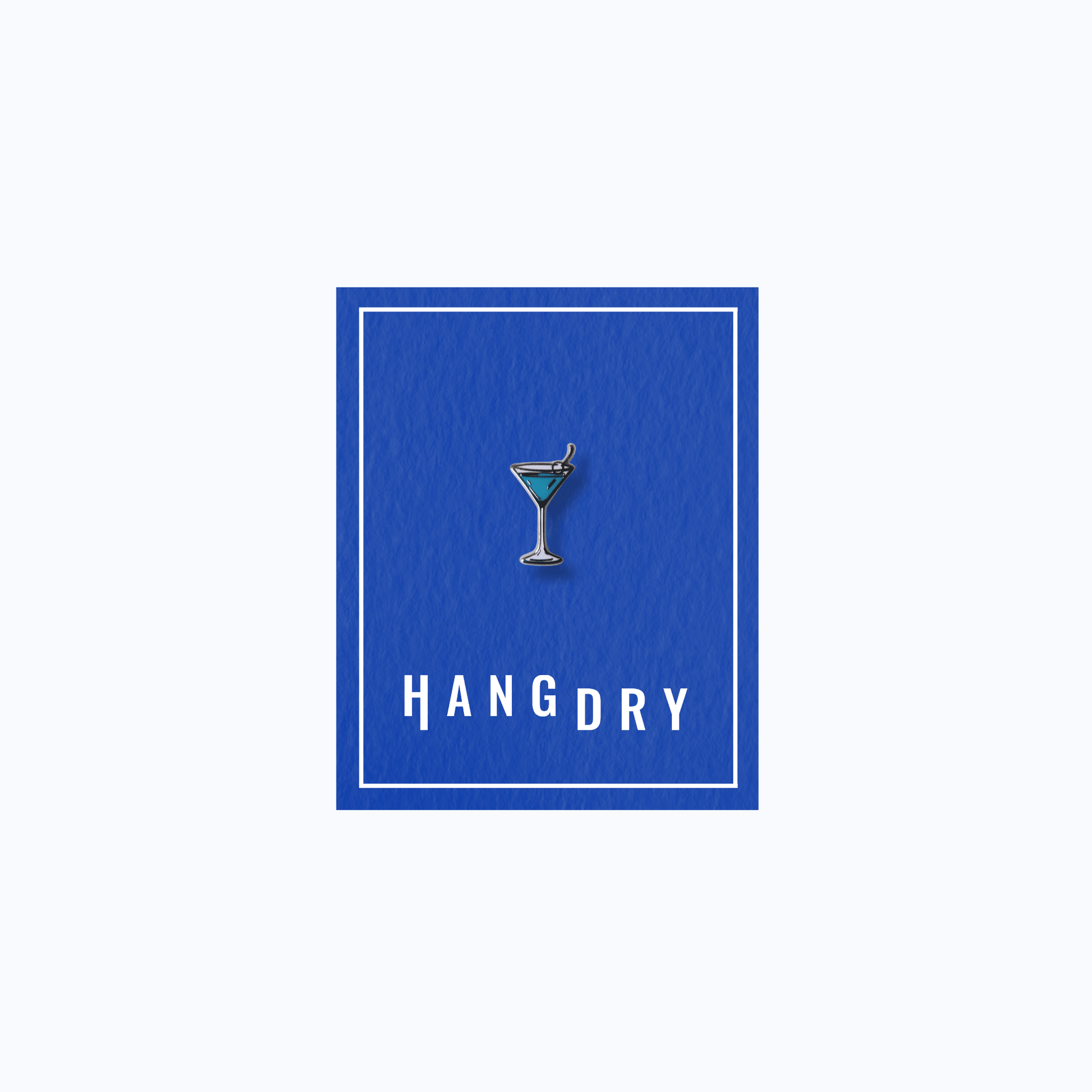 Hang Dry Sunday Dinner enamel pin — classic martini glass shape, displayed on Hang Dry blue branded card