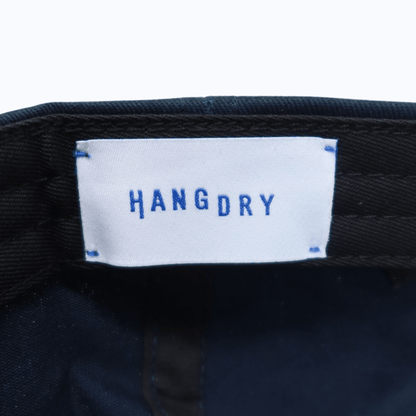 Hang Dry ballcap branded interior label — clean branding detail and quality craftsmanship