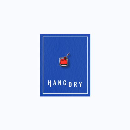 Hang Dry Sunday Dinner enamel pin — rocks glass shape, displayed on Hang Dry blue branded card