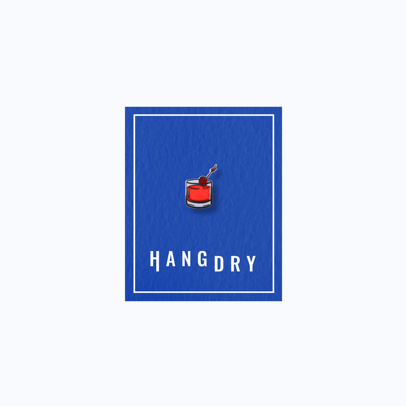 Hang Dry Sunday Dinner enamel pin — rocks glass shape, displayed on Hang Dry blue branded card