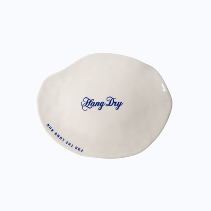 Hang Dry Sunday Dinner Luncheon Plate — organic-shaped white porcelain with Hang Dry logo and "For The Long Run" tagline