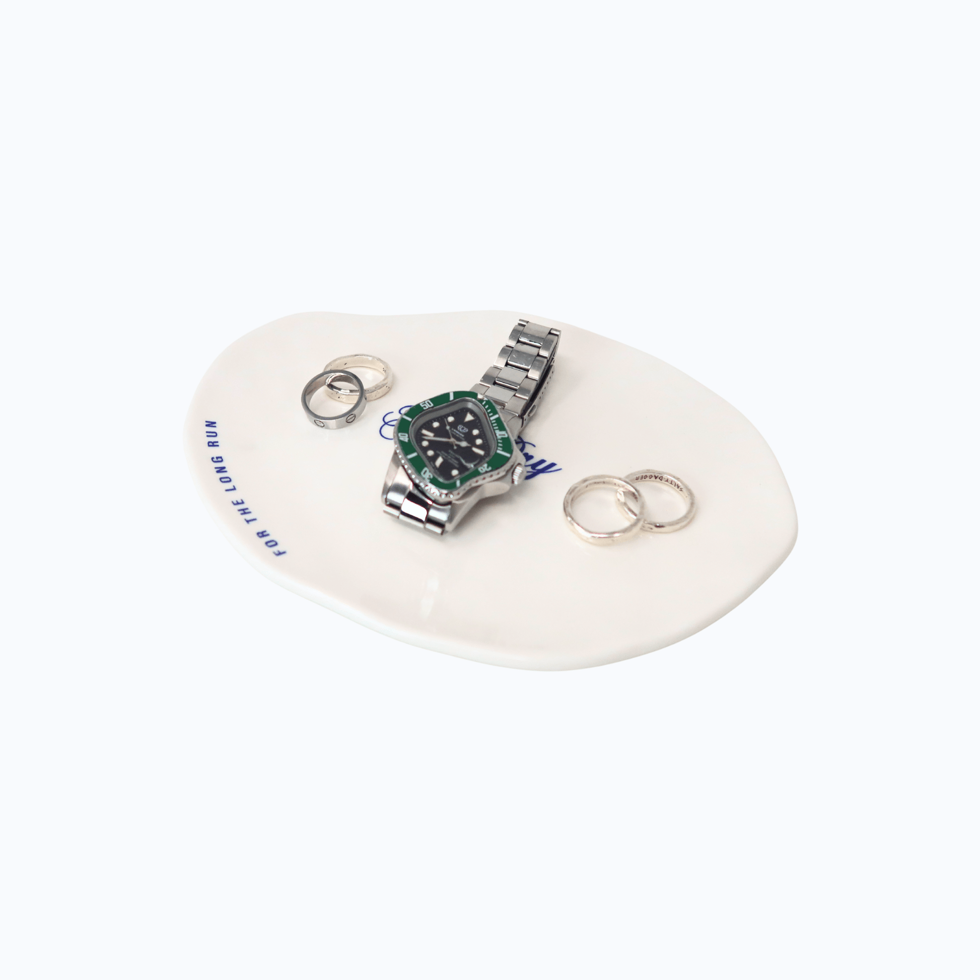 Hang Dry Sunday Dinner Luncheon Plate styled with a watch and silver rings — organic white ceramic with logo